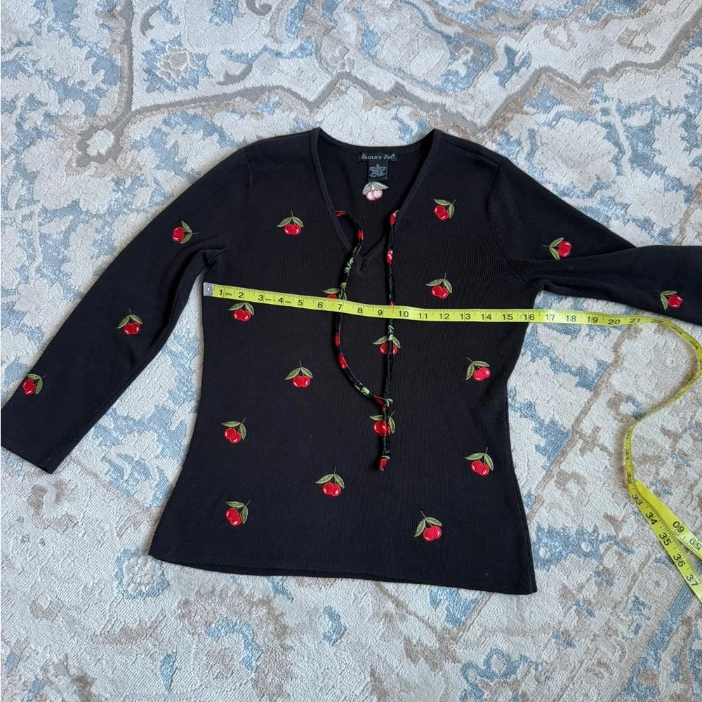 Black long sleeve Y2K vibes top with red cherries and a tie front detail size S